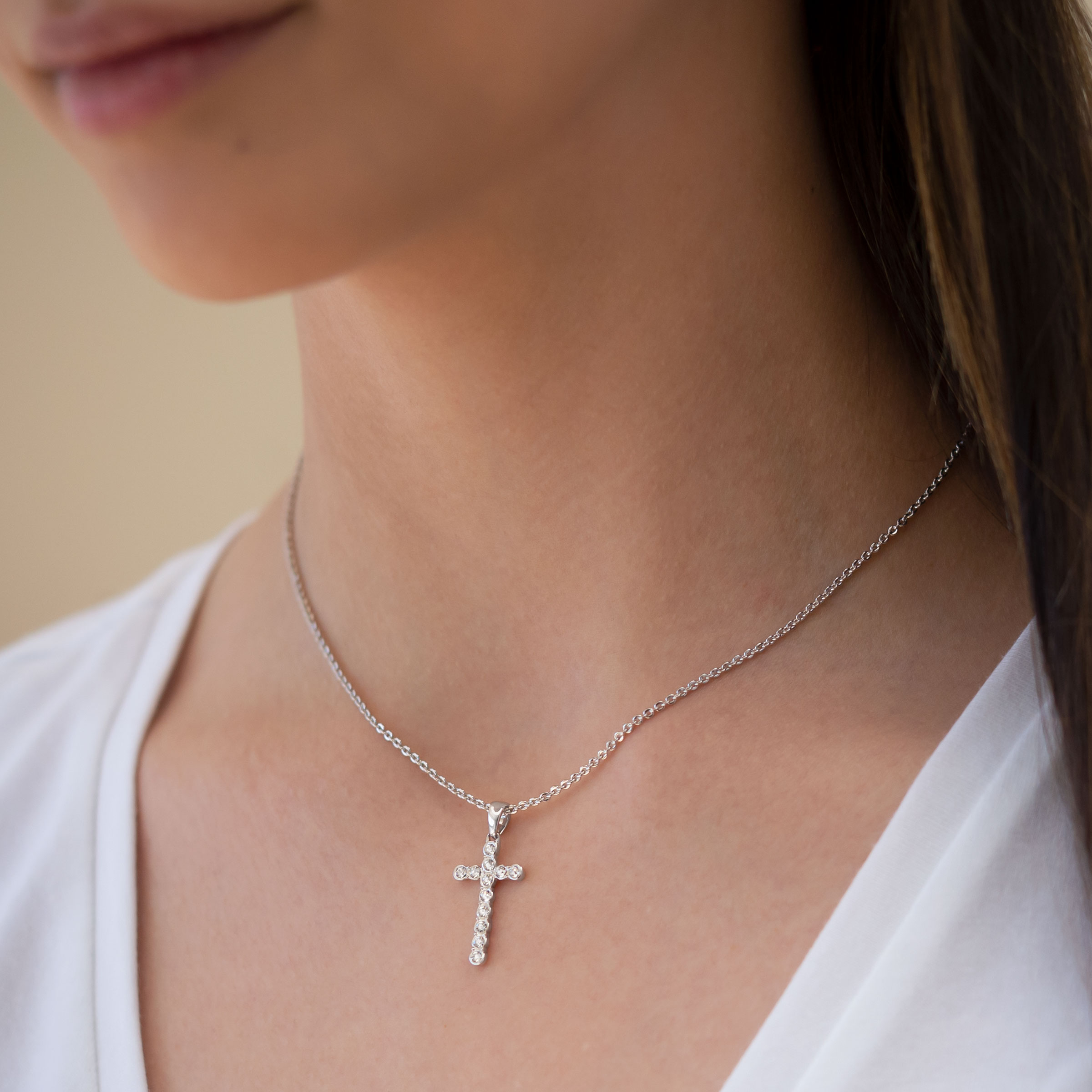 Petite cross necklace top