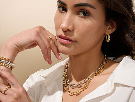 Woman wearing mixed metal jewelry