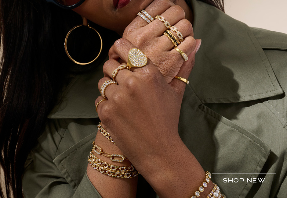 Woman wearing gold layered jewelry
